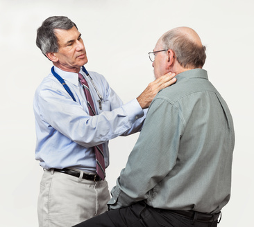 Doctor Examining Senior Patient's Swollen Glands